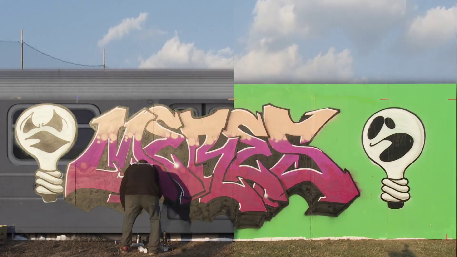 Curator Meres One painting one of the featured works.